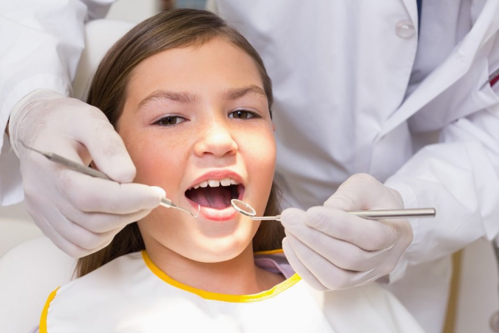 Как безболезненно удалить зуб дома - советы стоматологов