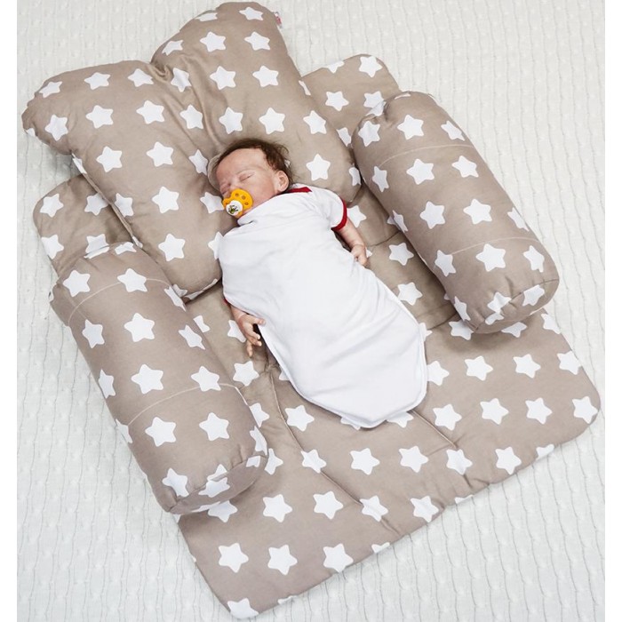 Анатомическая подушка для новорожденного