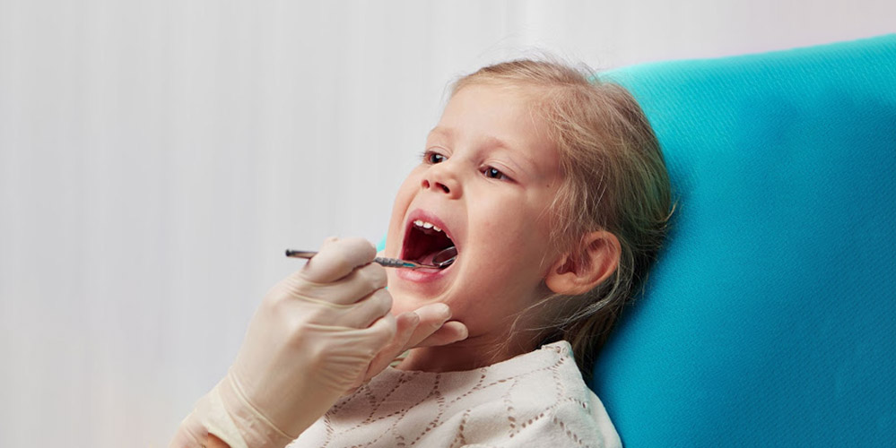 Удаление молочных зубов у детей цены в москве