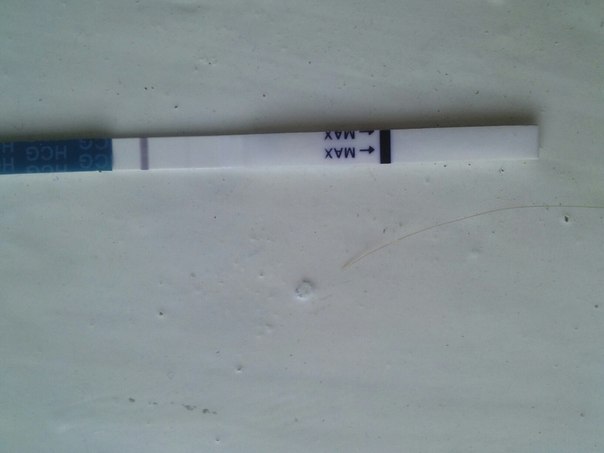 Что означает слабая полоска на тесте на беременность?