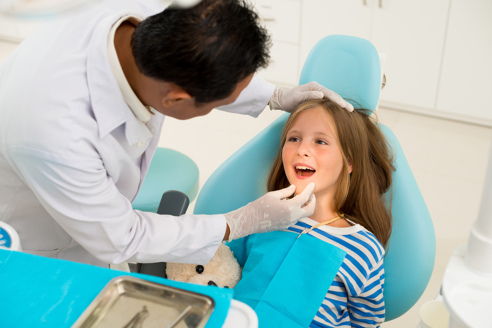 Лечение зубов у детей